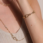Crystal Infinity Linked Bracelet in Gold Plated Stainless Steel