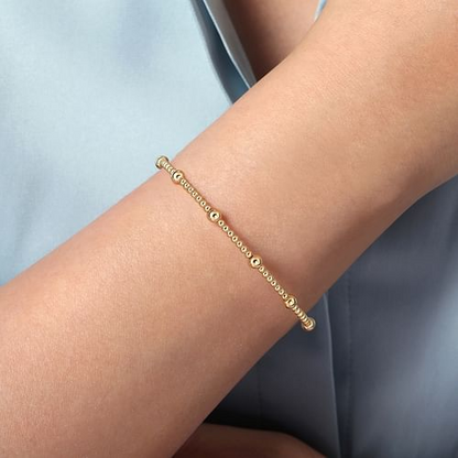 Graduated Beaded Station Bangle in 14K Yellow Gold