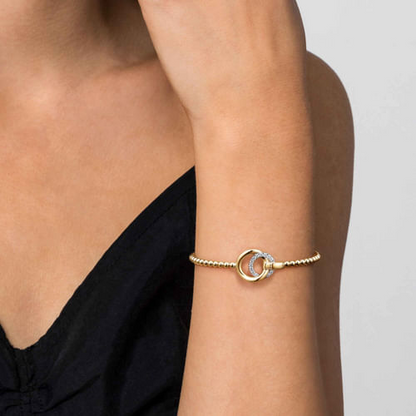 Diamond Interlocking Circle Bangle in 14K Yellow Gold