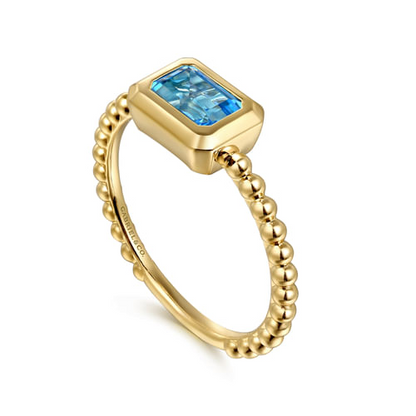 Blue Topaz Bezel Band in 14K Yellow Gold