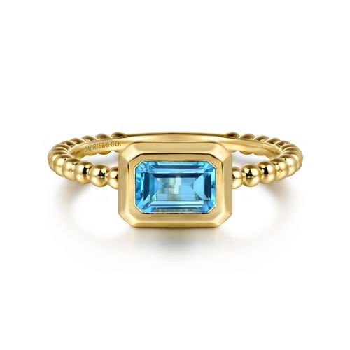 Blue Topaz Bezel Band in 14K Yellow Gold