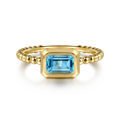 Blue Topaz Bezel Band in 14K Yellow Gold